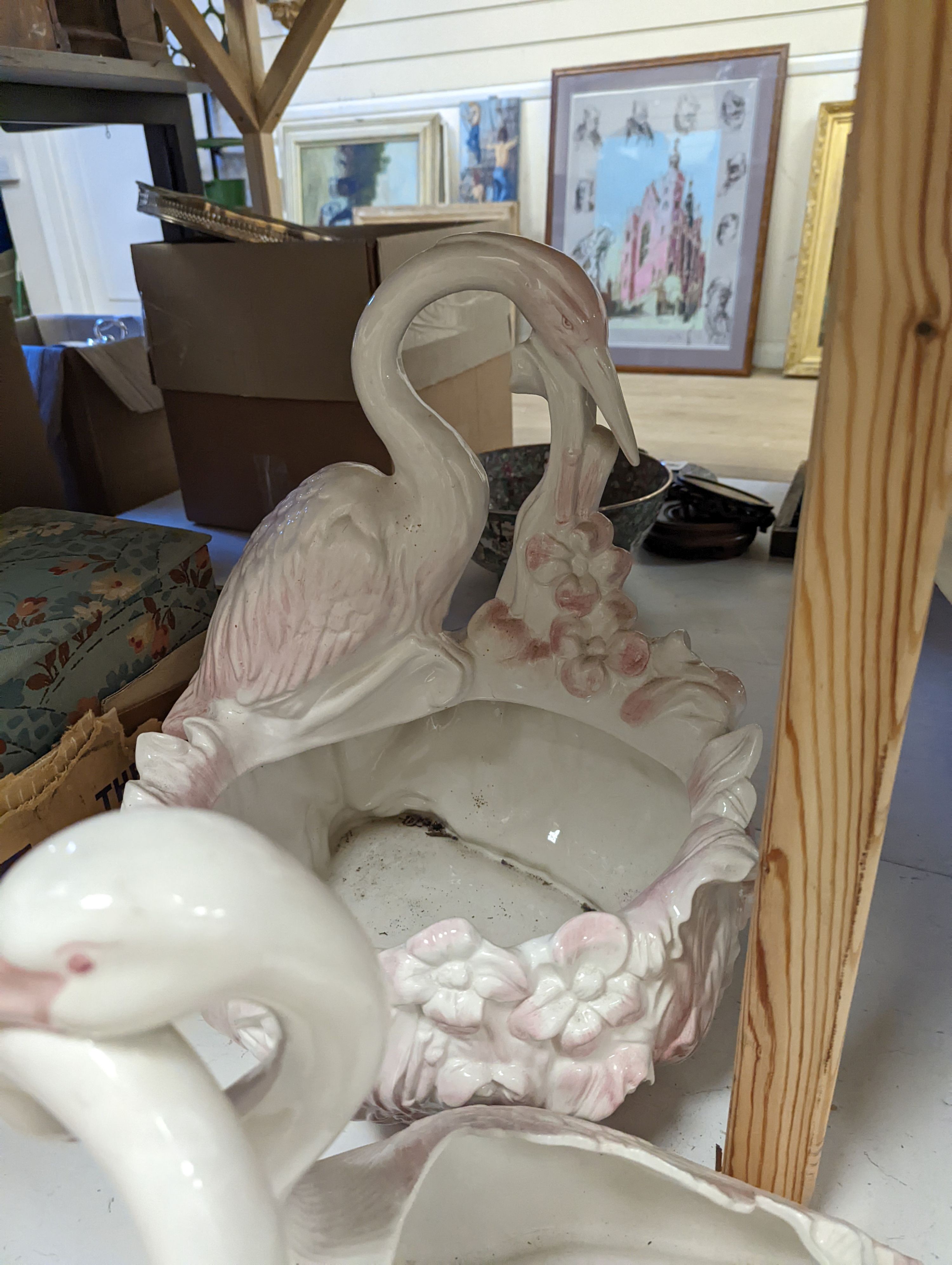 Decorative modern continental pottery, including two jardinières, modelled with swans, a white glazed urn